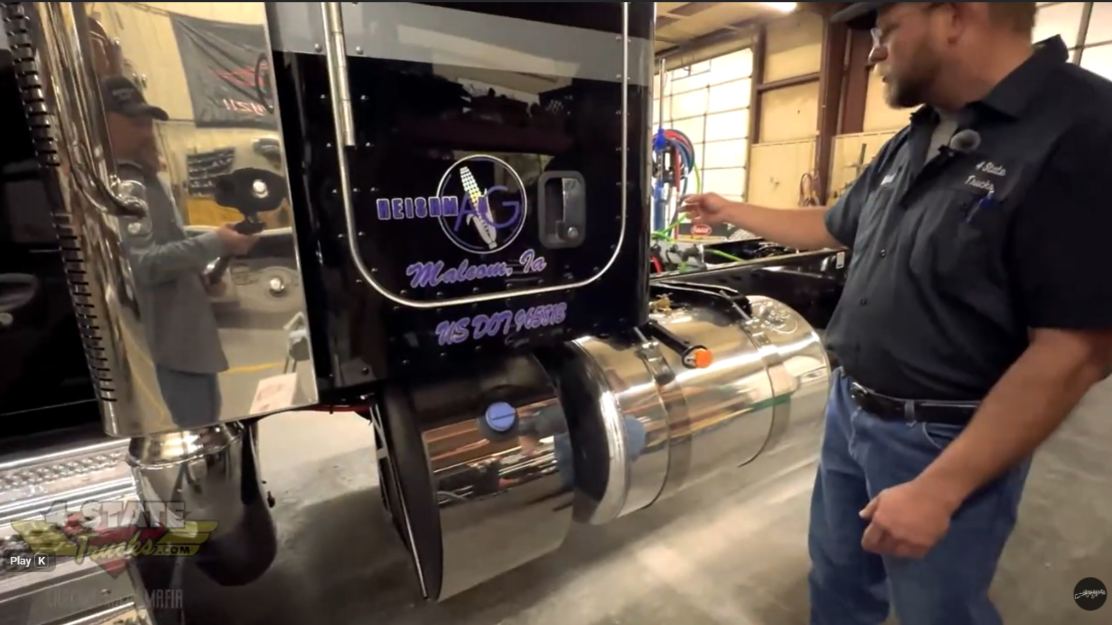 Fuel tank and sleeper panel area on Peterbilt 589 showing factory tank configuration before custom stainless panels and DEF cover installation.